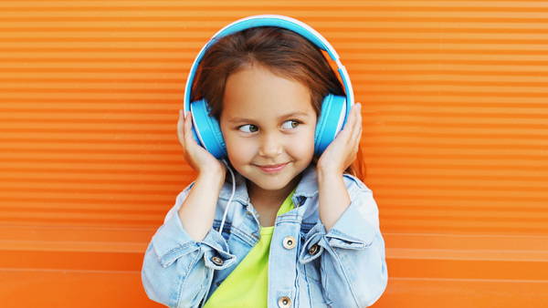 Young girl wearing headphones