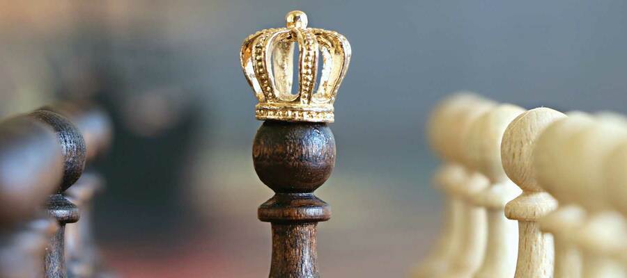 Chess piece with a crown