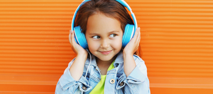 Young girl wearing headphones